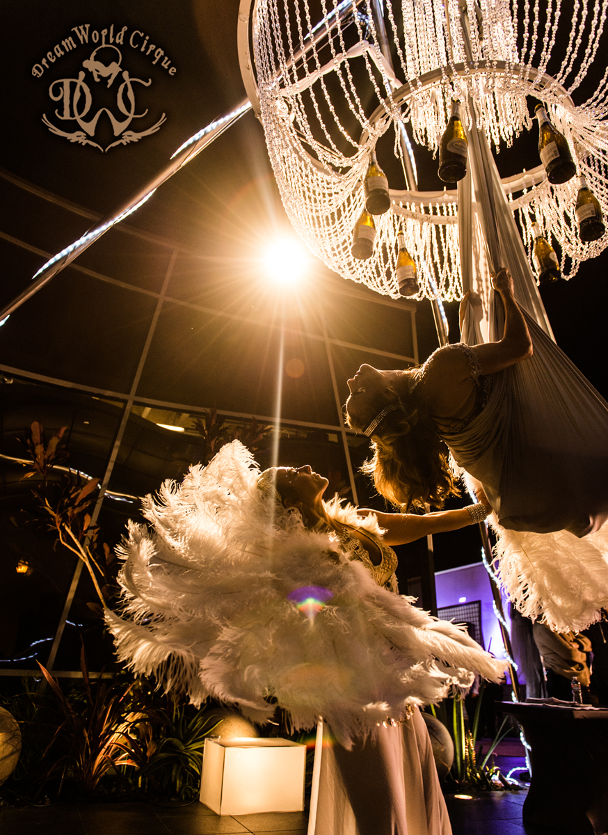 Aerial Bartending Chandelier with Stunning Performers and Feather Fans